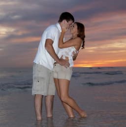 Couple embracing in silhouette